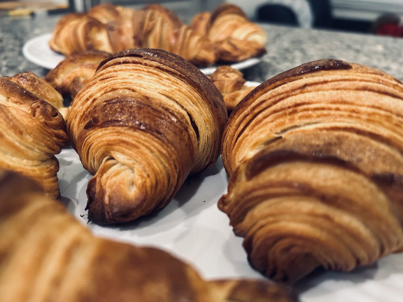 A tray of freshly baked croissants
