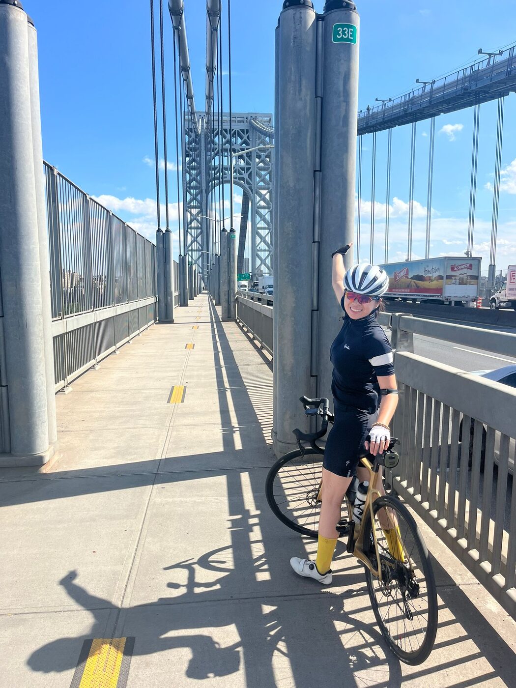 Anna with her bicycle on the George Washington Bridge